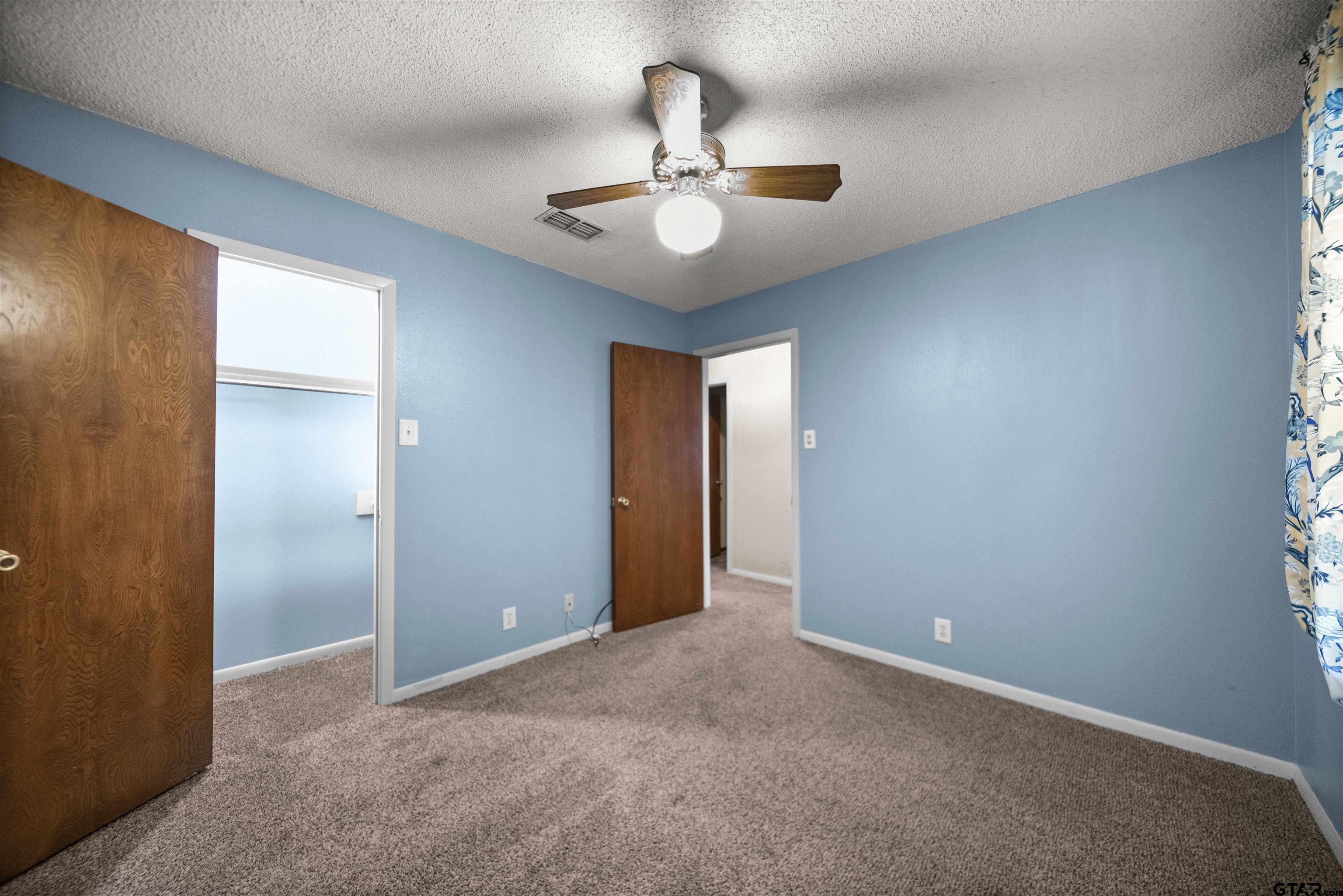 13518 Larry Lane Tyler, TX 75709 - Photo 22 of 28 a view of an empty room with a window