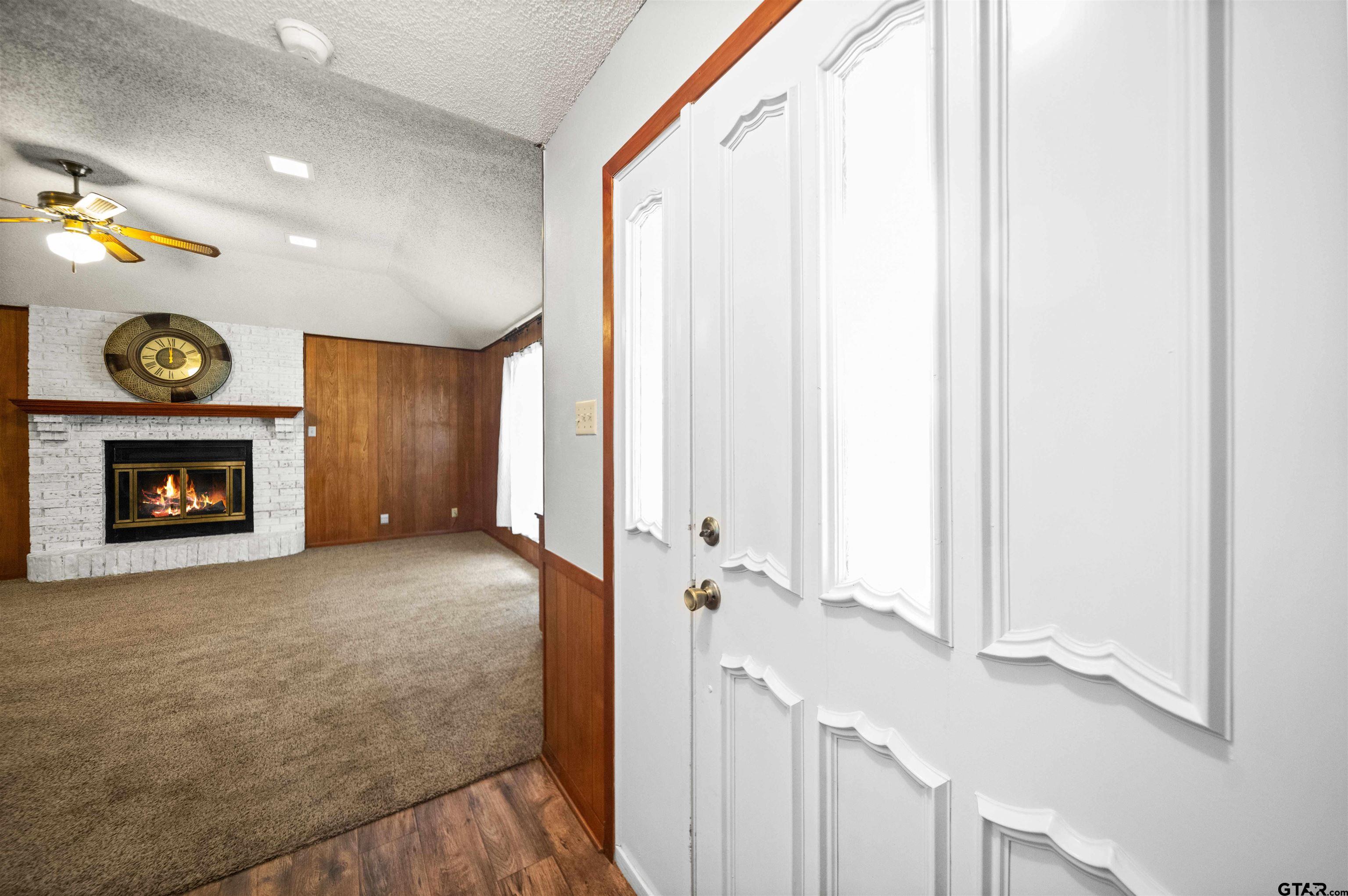 13518 Larry Lane Tyler, TX 75709 - Photo 6 of 28 a view of an entryway with a fireplace