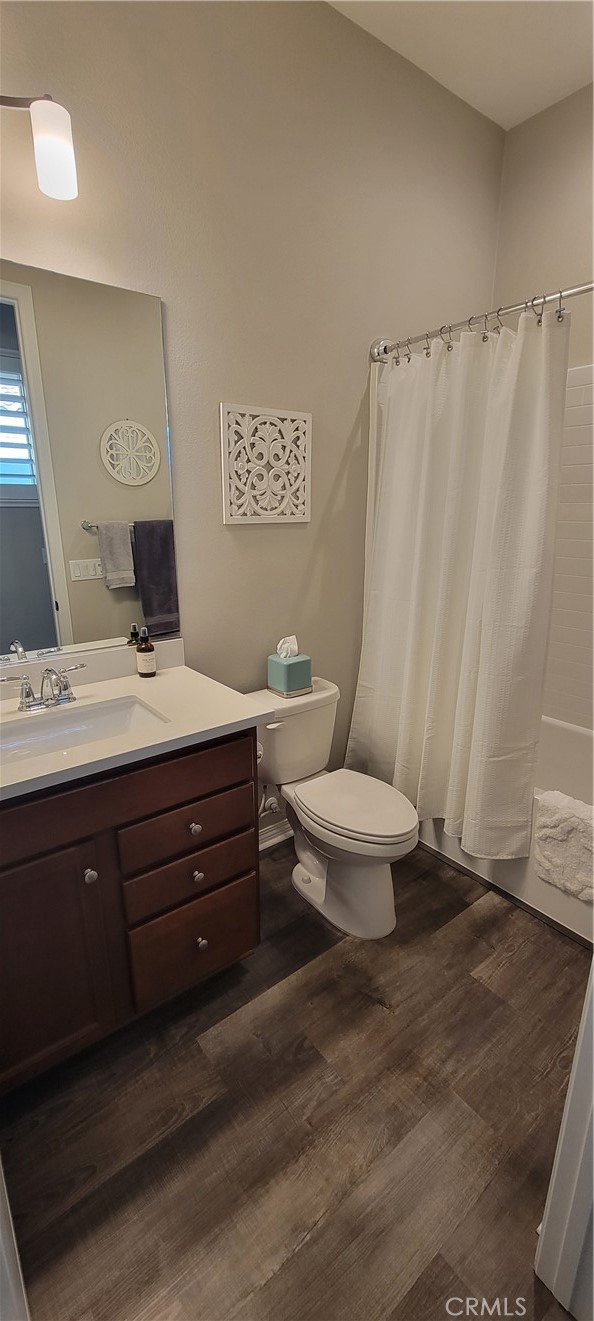 82 Burgundy Rancho Mirage, CA 92270 - Photo 24 of 42 a bathroom with a toilet a sink and a mirror
