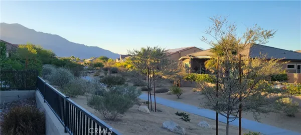 a view of a house with a mountain