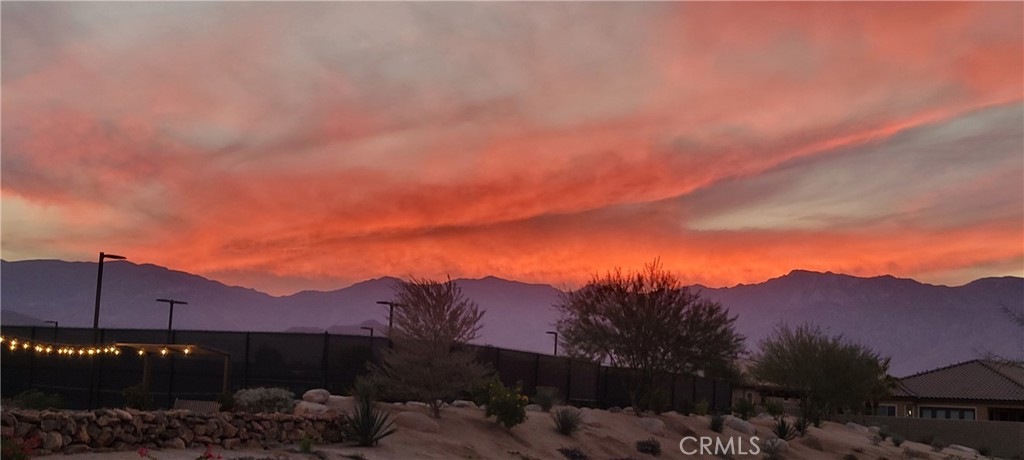 82 Burgundy Rancho Mirage, CA 92270 - Photo 33 of 42 a view of a house with a garden