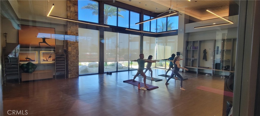 82 Burgundy Rancho Mirage, CA 92270 - Photo 40 of 42 a view of a livingroom with furniture wooden floor and a window