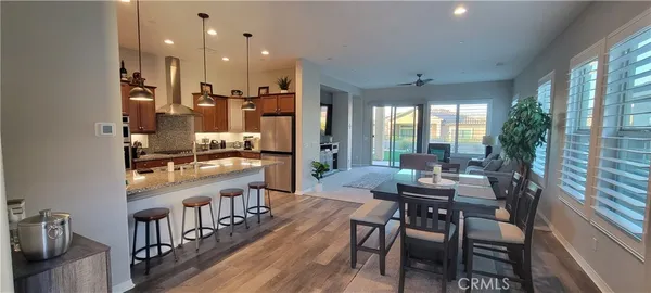 a view of a kitchen and dining room