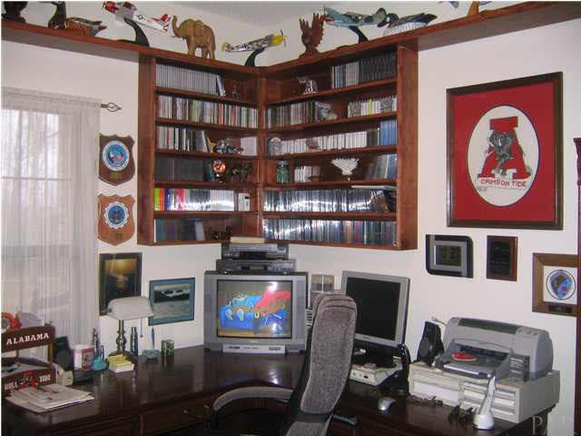 1475 Tedder Road Century, FL 32535 - Photo 11 of 24 BUILT IN RED OAK SHELVES IN STUDY