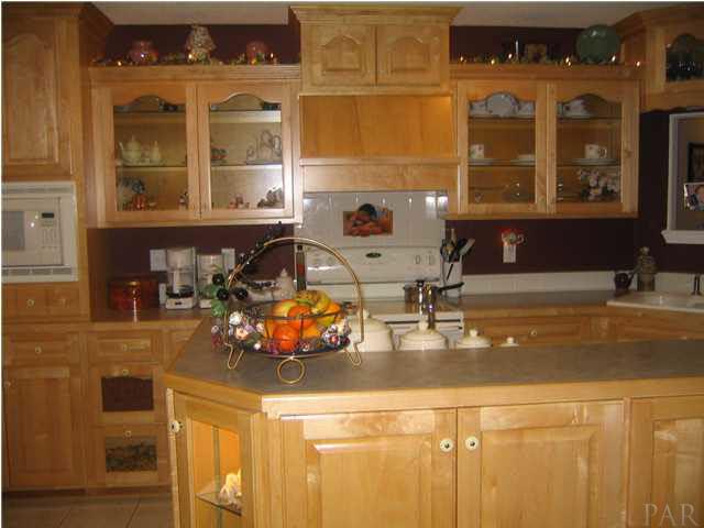 1475 Tedder Road Century, FL 32535 - Photo 20 of 24 DISPLAY CABINETS & ISLAND
