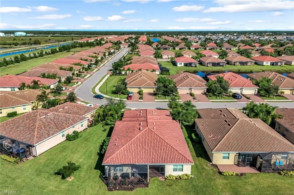 1750 Alameda Drive Naples, FL 34120 - Photo 20 of 39 an aerial view of residential houses with outdoor space