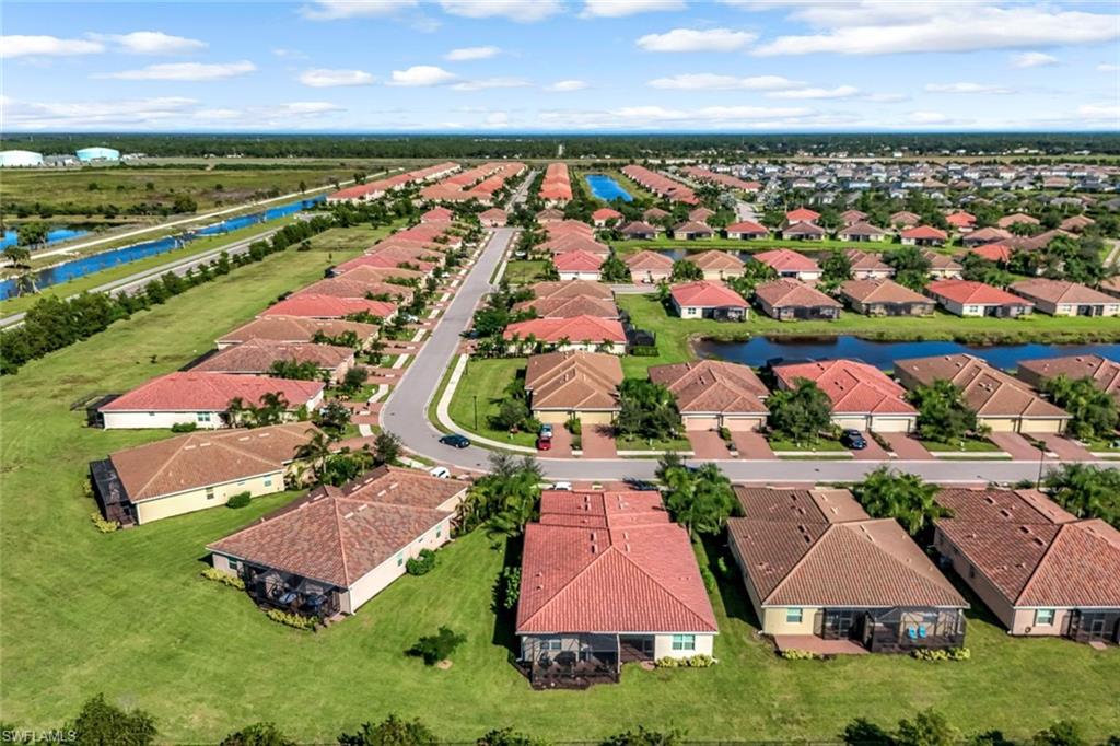 1750 Alameda Drive Naples, FL 34120 - Photo 2 of 39 an aerial view of residential houses with outdoor space