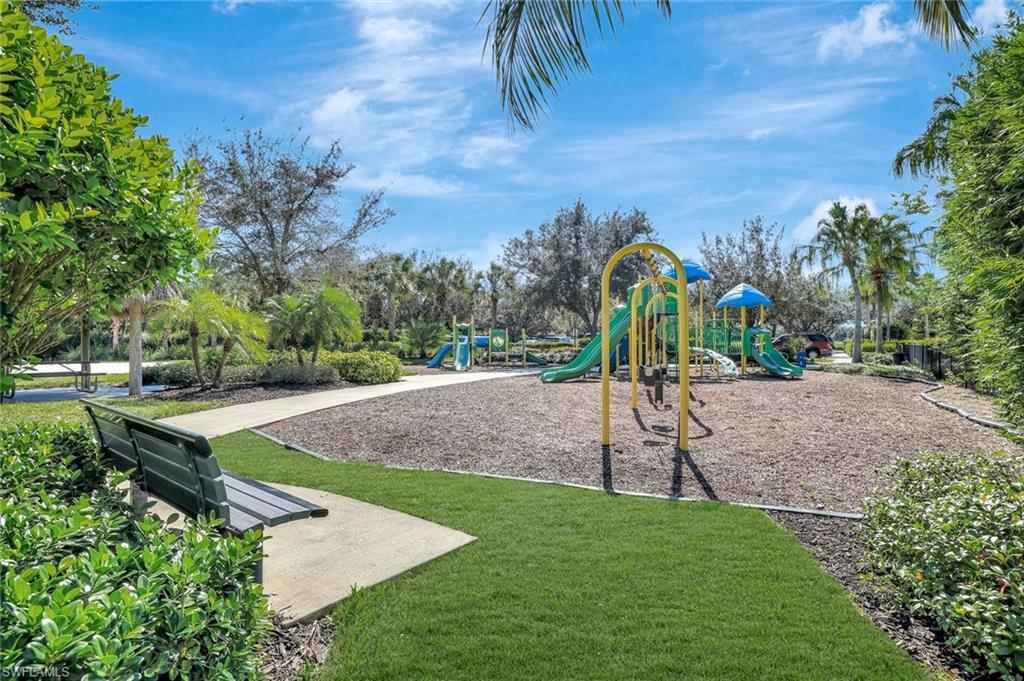 1750 Alameda Drive Naples, FL 34120 - Photo 28 of 39 a view of a park with swings and slides