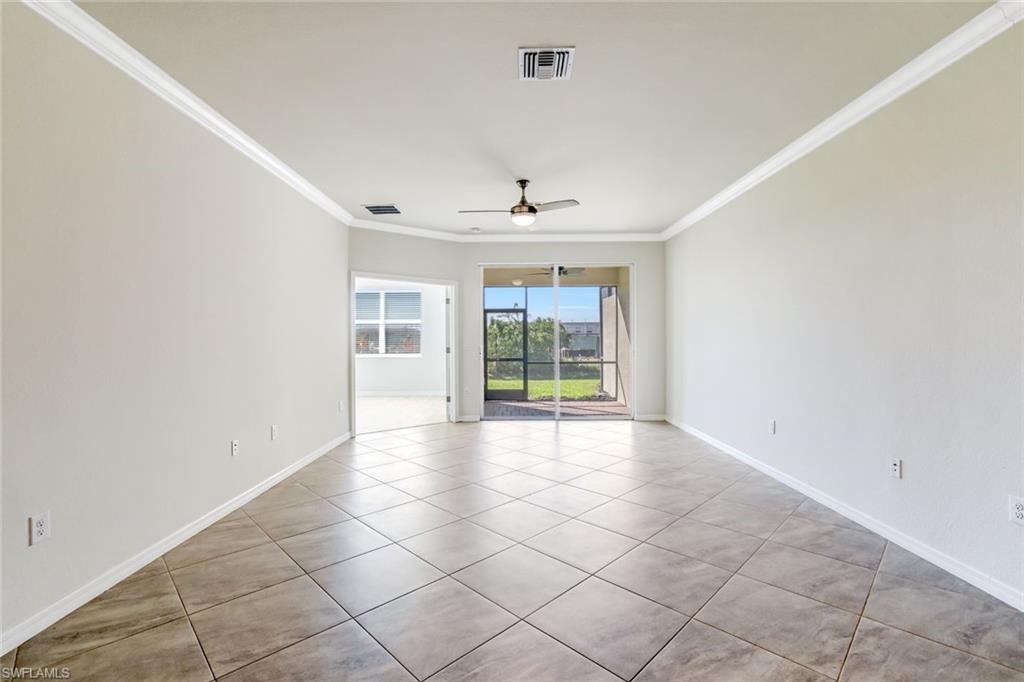 1750 Alameda Drive Naples, FL 34120 - Photo 4 of 39 a view of an empty room with a window