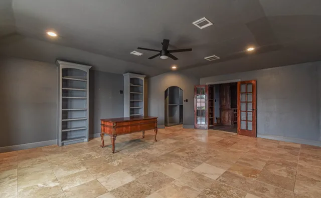 a livingroom with furniture and wooden floor