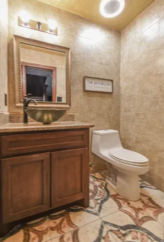 a front view of a house with a garden and porch