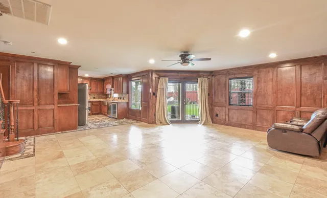 a view of a livingroom with furniture and entryway