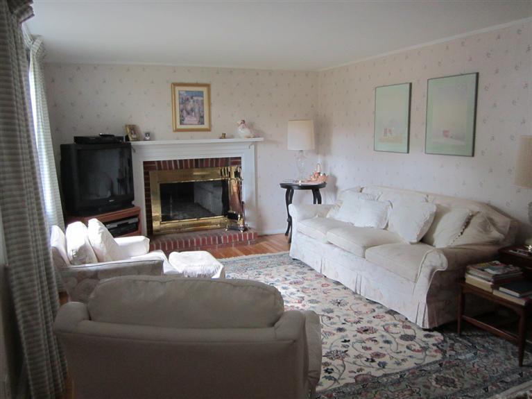 18 Birchill Road Centerville, MA 02632 - Photo 11 of 18 a living room with furniture and a fireplace