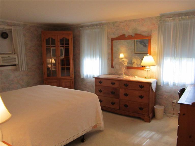 18 Birchill Road Centerville, MA 02632 - Photo 13 of 18 a bedroom with a bed and window
