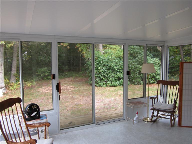 18 Birchill Road Centerville, MA 02632 - Photo 3 of 18 a view of front door and porch with furniture