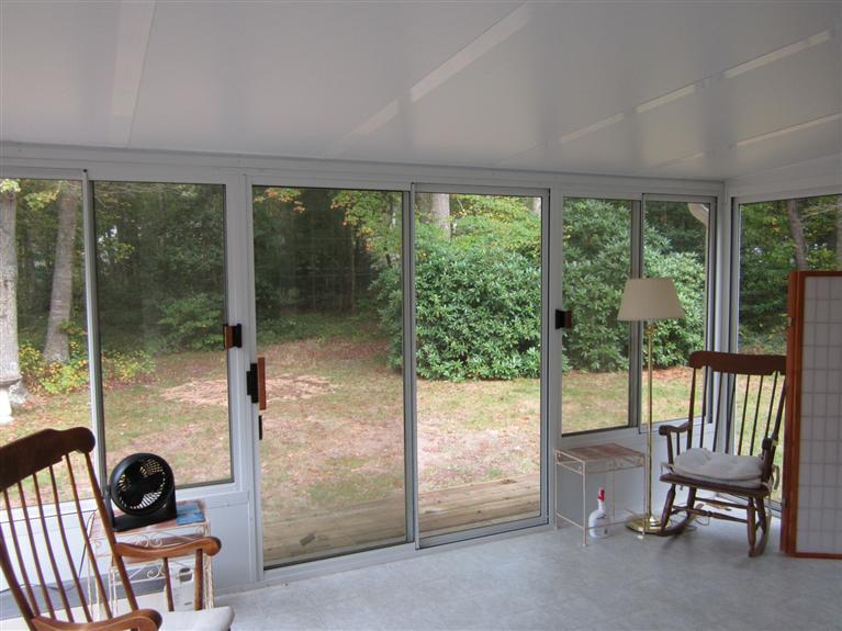 18 Birchill Road Centerville, MA 02632 - Photo 6 of 18 a view of front door and porch with furniture