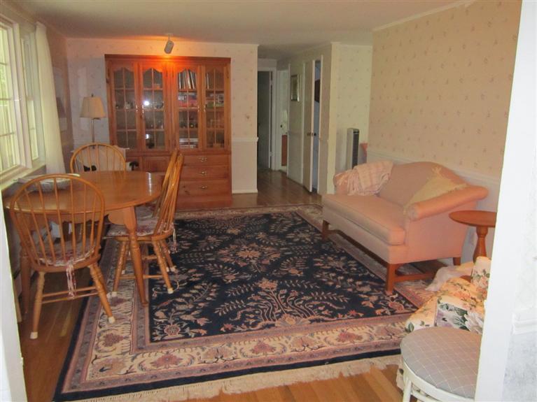 18 Birchill Road Centerville, MA 02632 - Photo 10 of 18 a living room with furniture and a rug