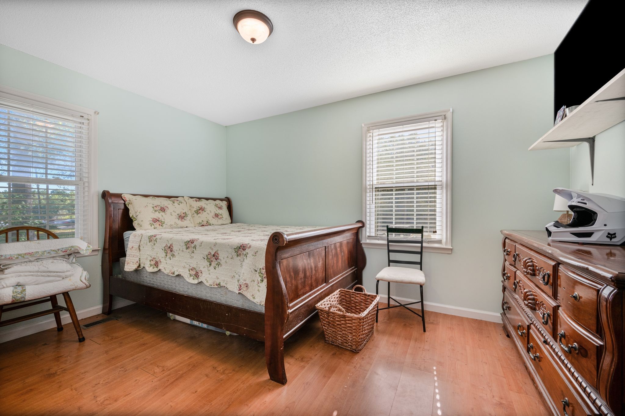 5835 Dog Creek Road Primm Springs, TN 38476 - Photo 12 of 37 a bedroom with a bed and a tv