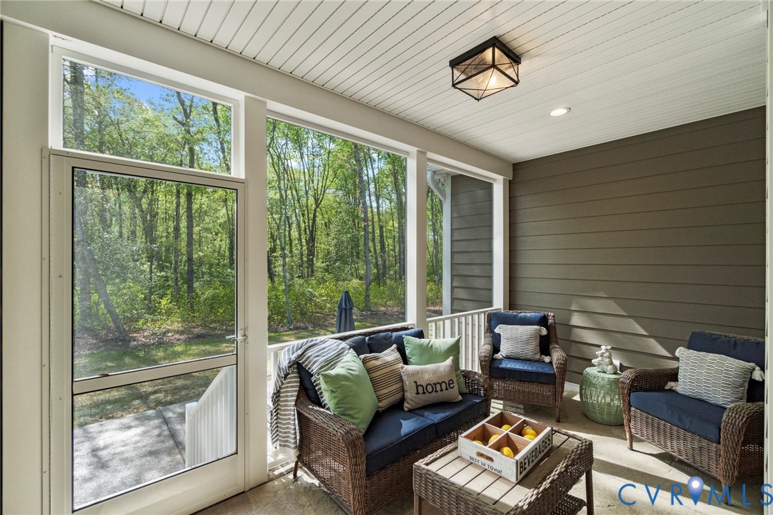 Screened porch featuring a beadboard ceiling, rece