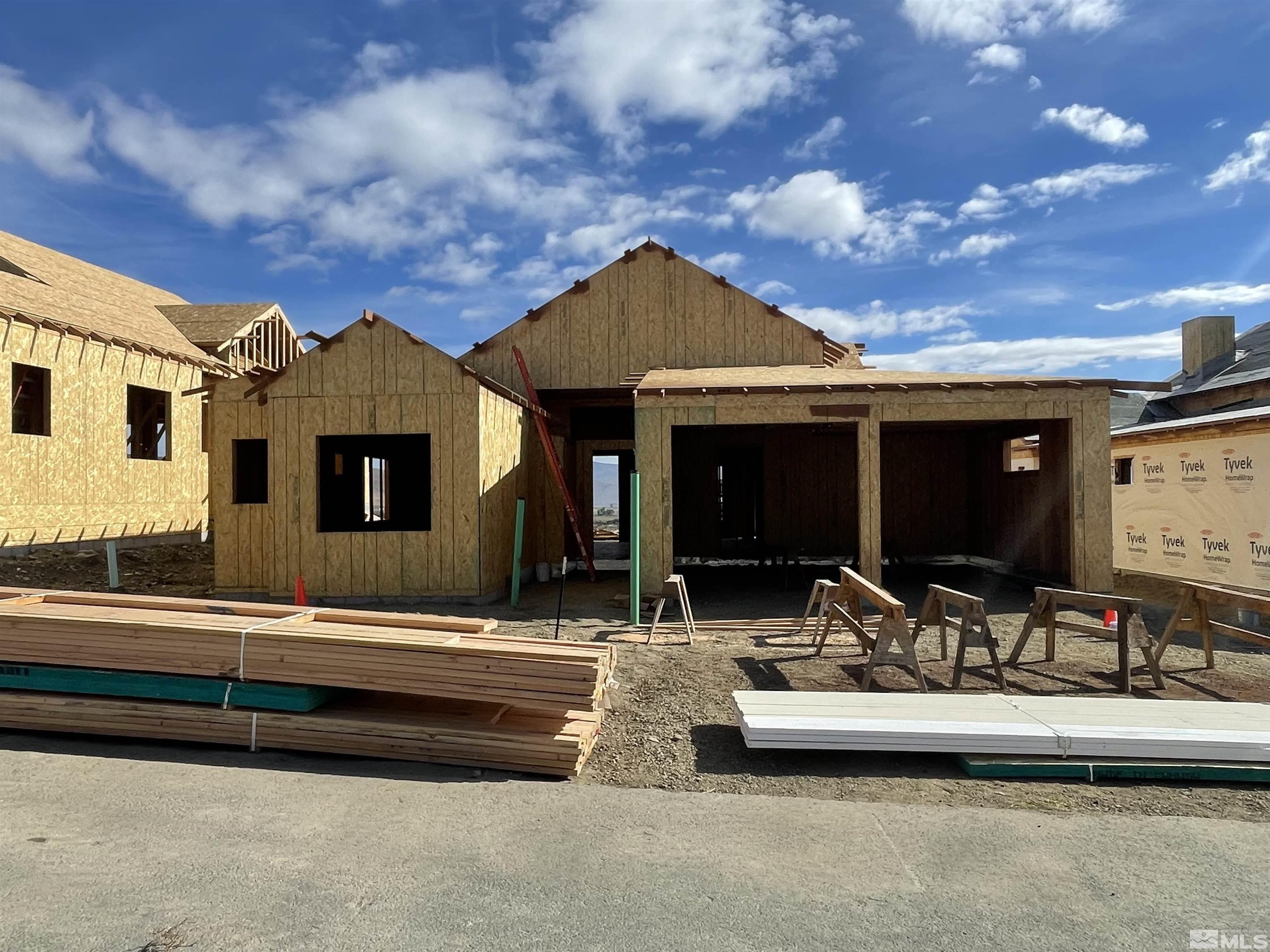 a view of house with yard outdoor seating and barbeque oven