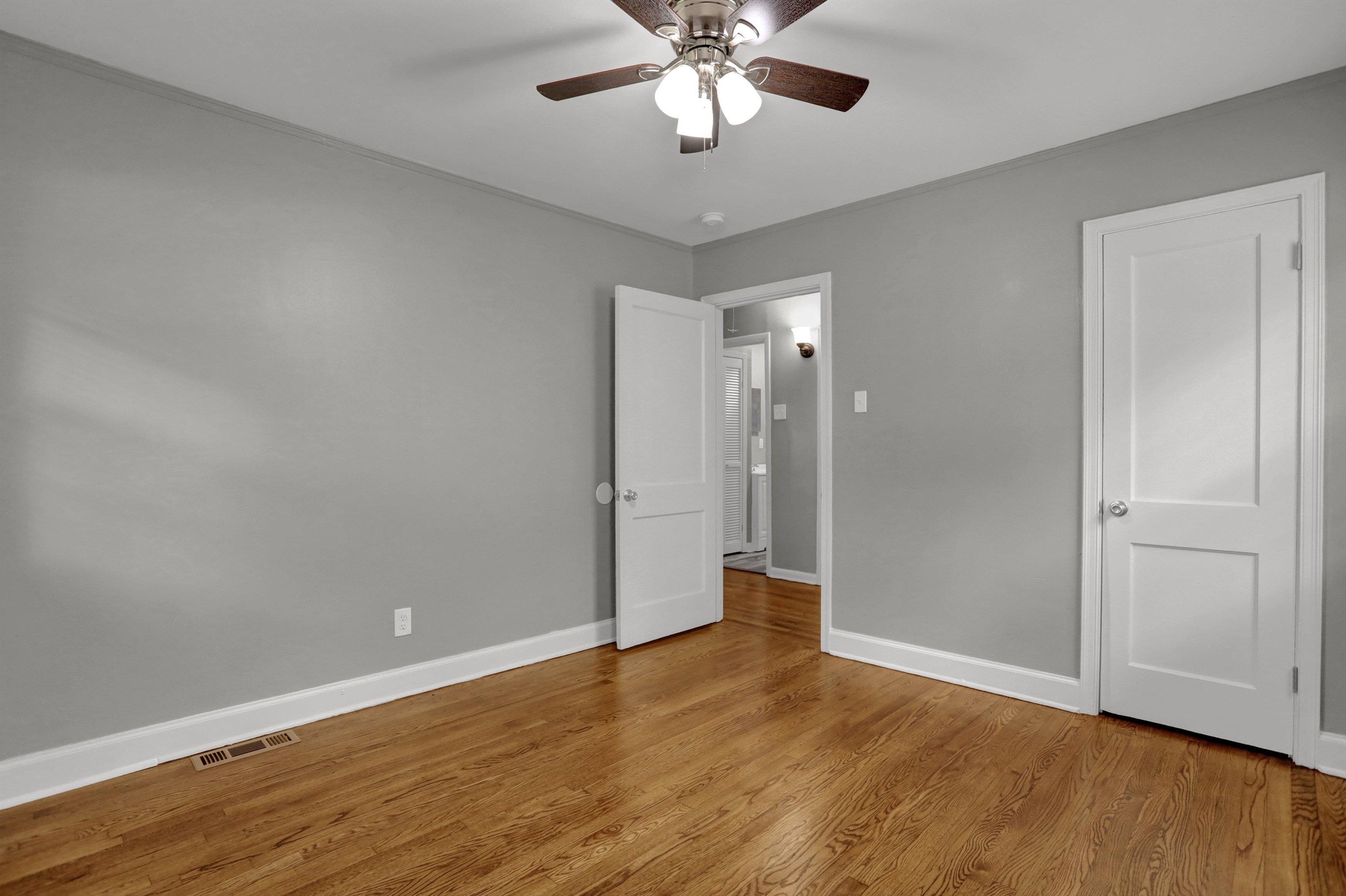3855 South Brighton Road Memphis, TN 38128 - Photo 16 of 21 a view of an empty room and wooden floor