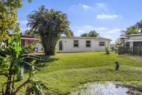 a house view with a garden space
