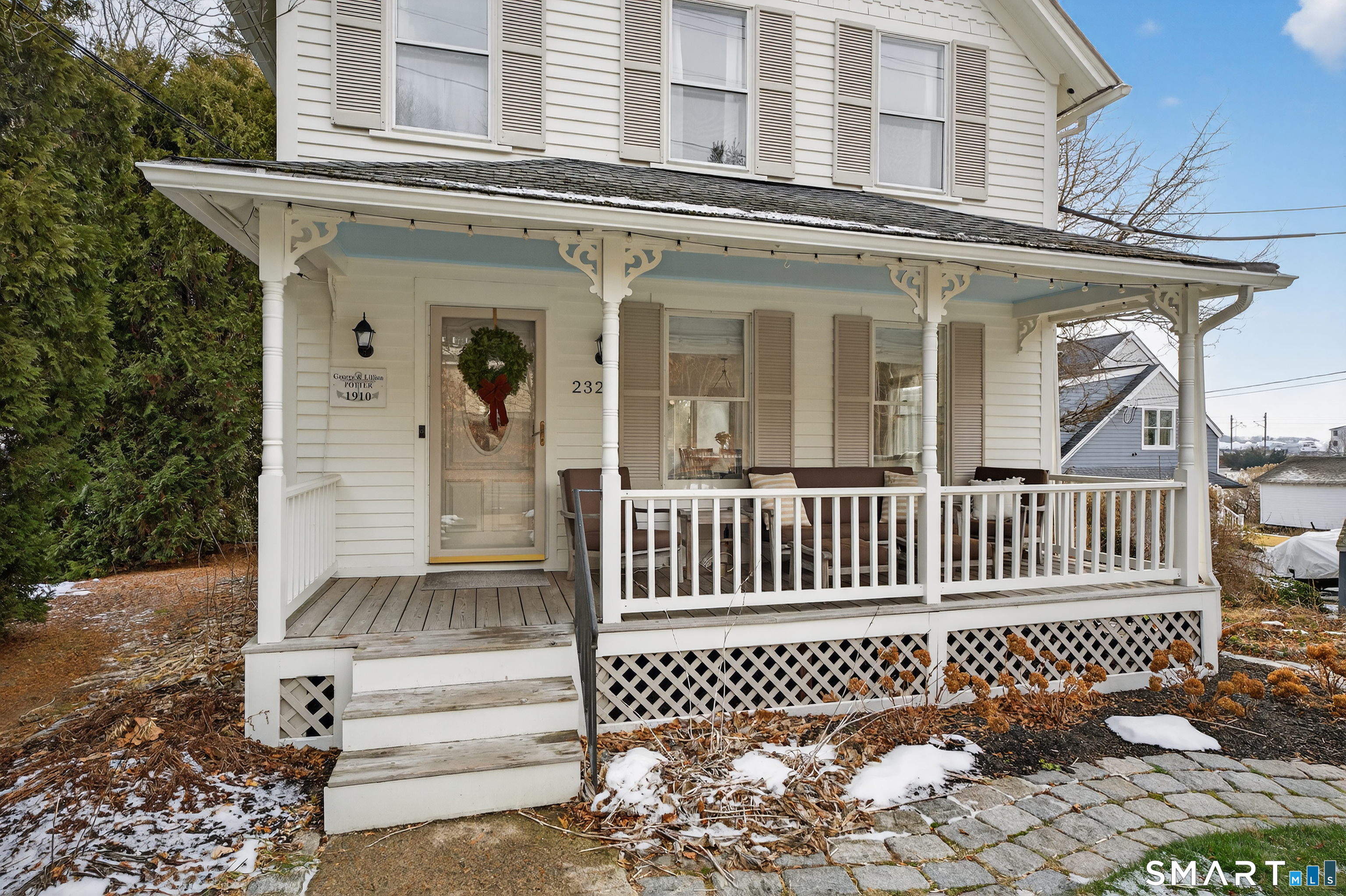 232 Noank Road Groton, CT 06355 - Photo 1 of 1 front view of a house with a bench