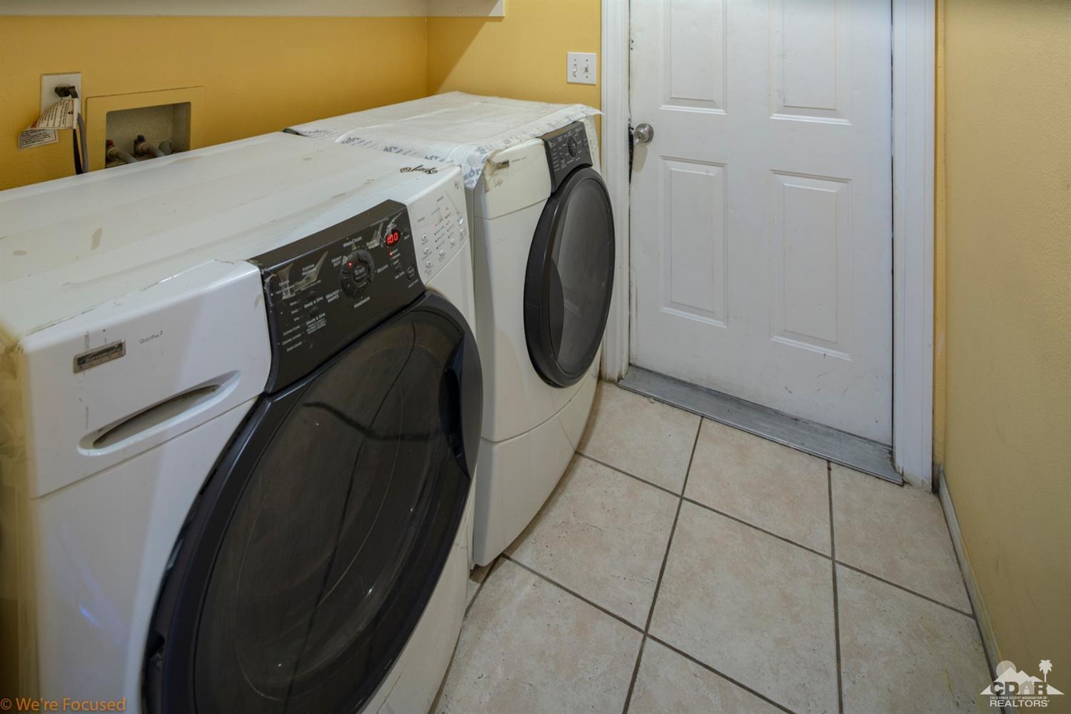 67235 Ovante Road Cathedral City, CA 92234 - Photo 12 of 16 a utility room with dryer and washer