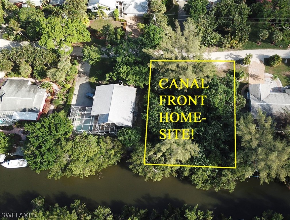 an aerial view of a house with a garden