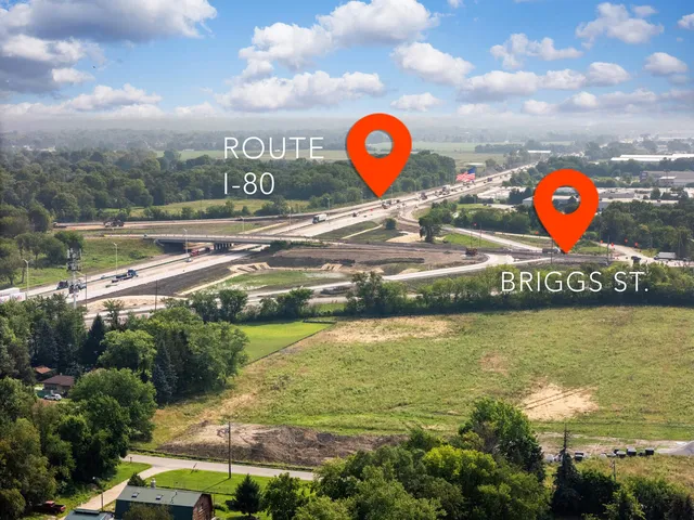 a view of swimming pool with a yard and in the background