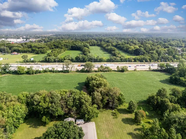 a view of a town with mountains in the background