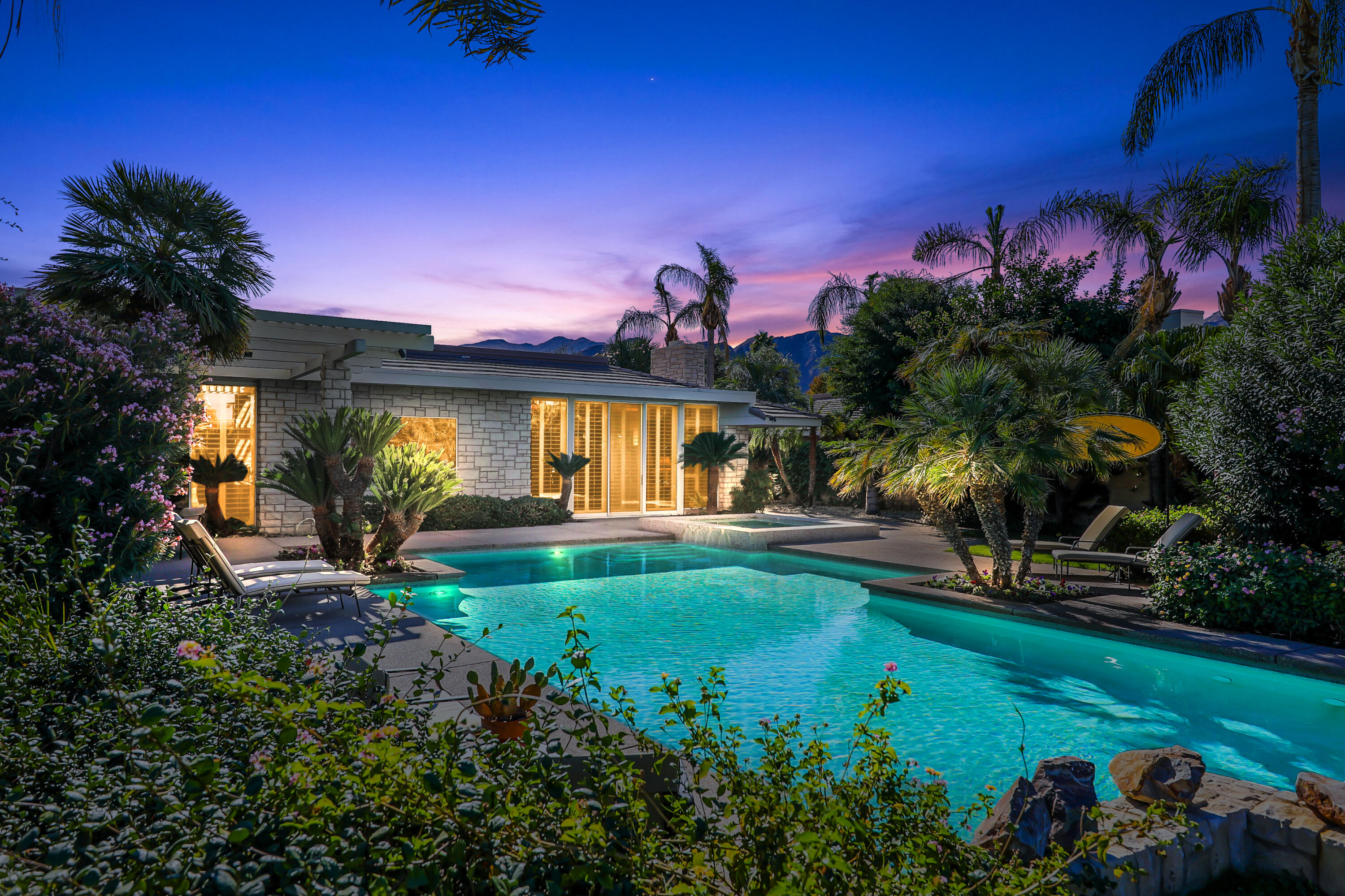 44 Fincher Way Rancho Mirage, CA 92270 - Photo 1 of 56 a view of a house with a swimming pool