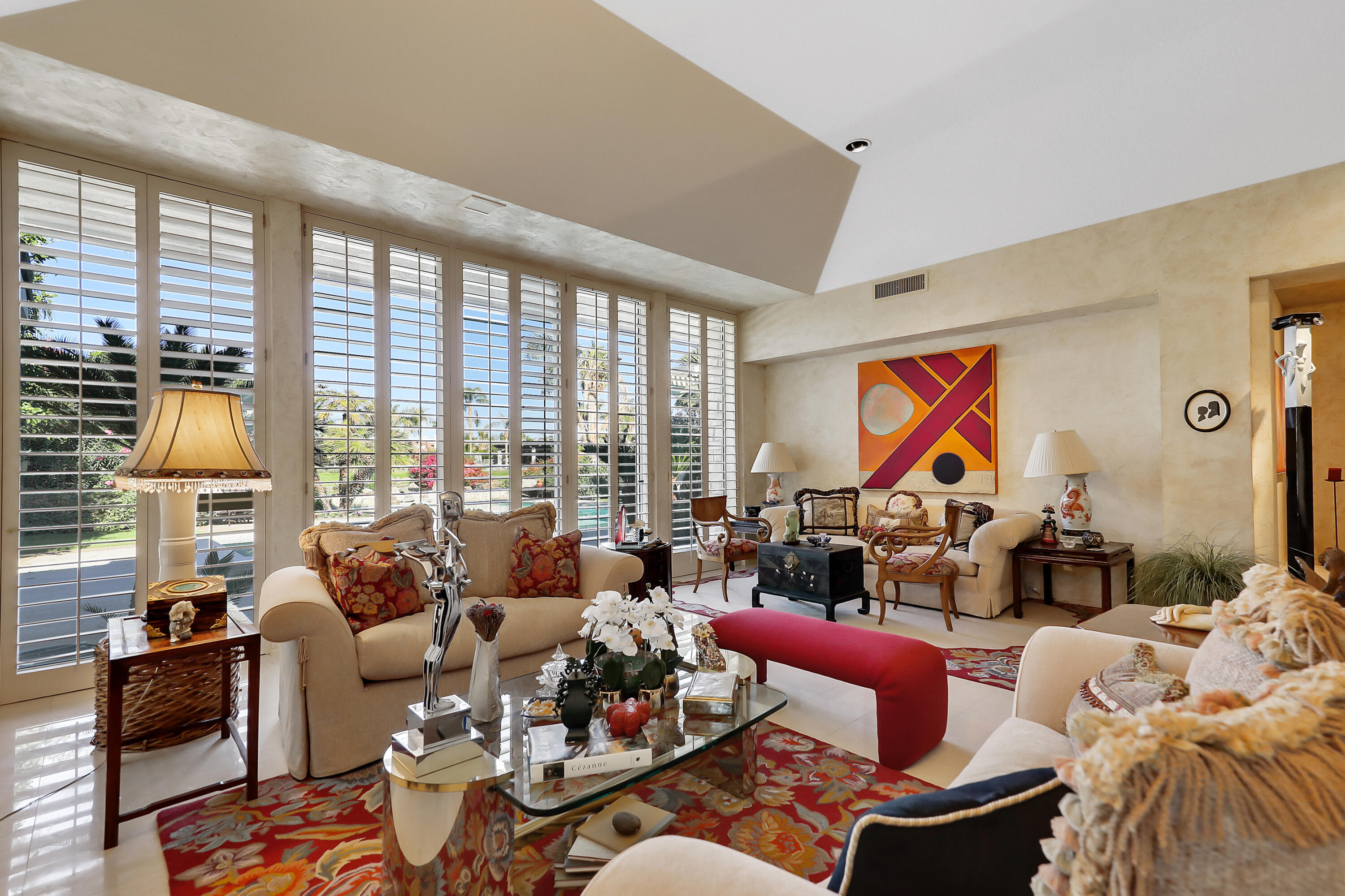 44 Fincher Way Rancho Mirage, CA 92270 - Photo 14 of 56 a living room with furniture and a floor to ceiling window