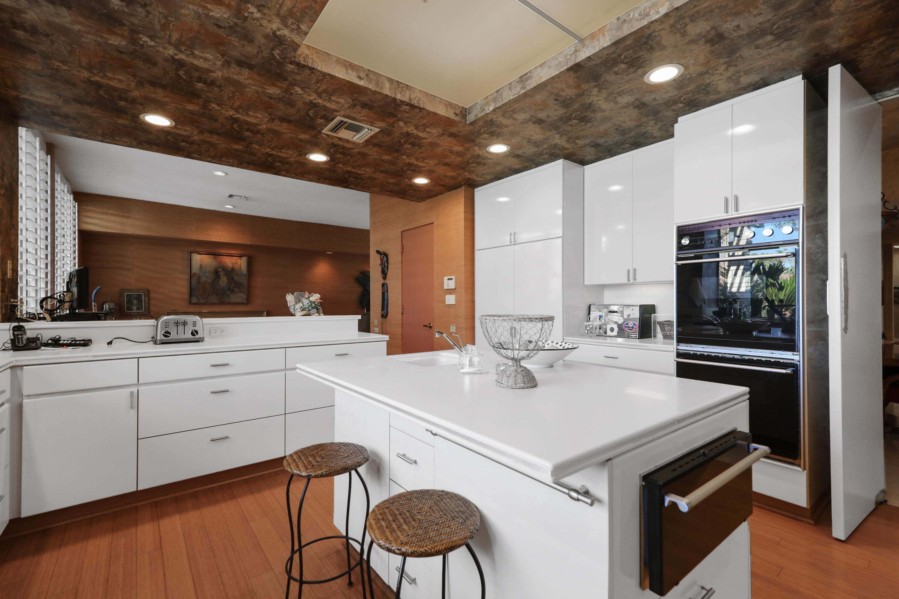 44 Fincher Way Rancho Mirage, CA 92270 - Photo 24 of 56 a kitchen with a sink appliances and cabinets
