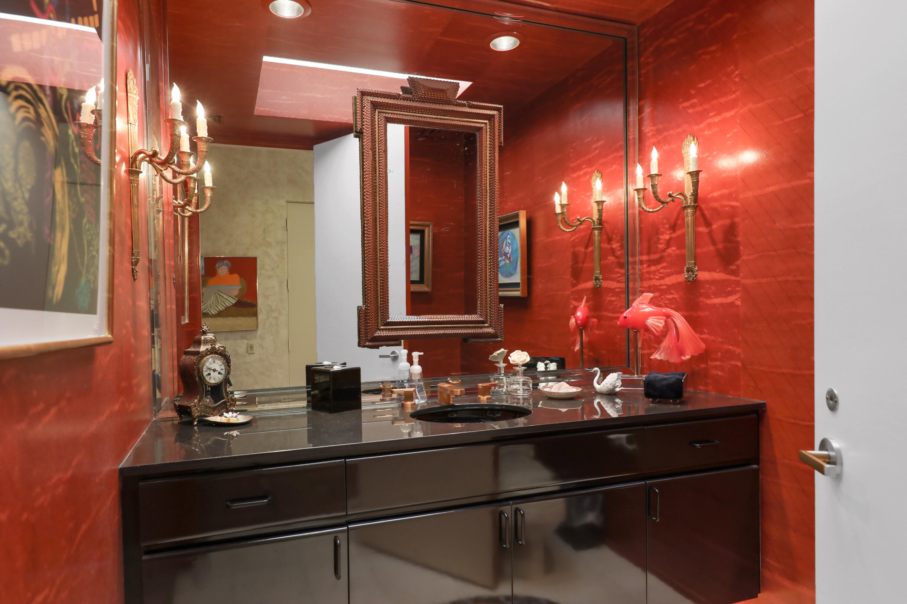 44 Fincher Way Rancho Mirage, CA 92270 - Photo 30 of 56 a bathroom with a sink and a mirror