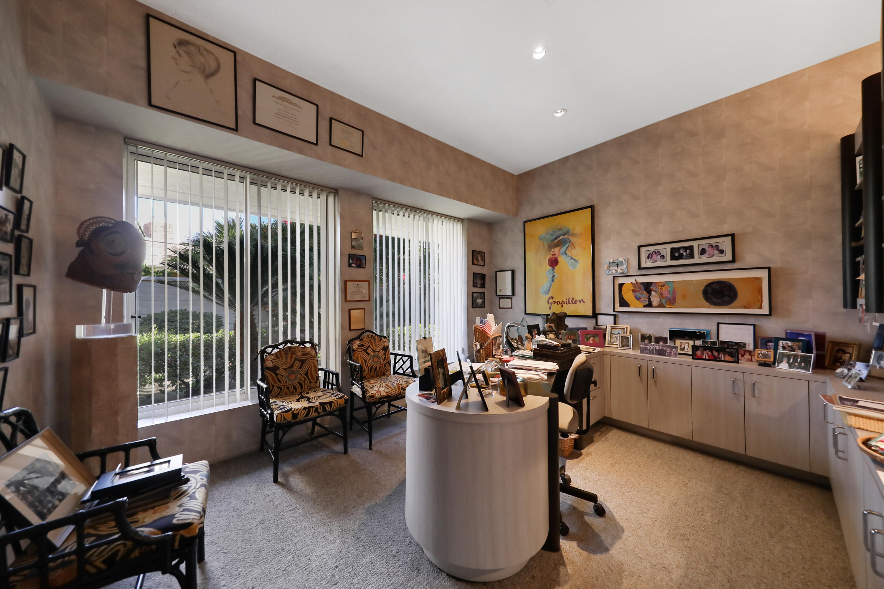 44 Fincher Way Rancho Mirage, CA 92270 - Photo 35 of 56 a living room with furniture and a flat screen tv