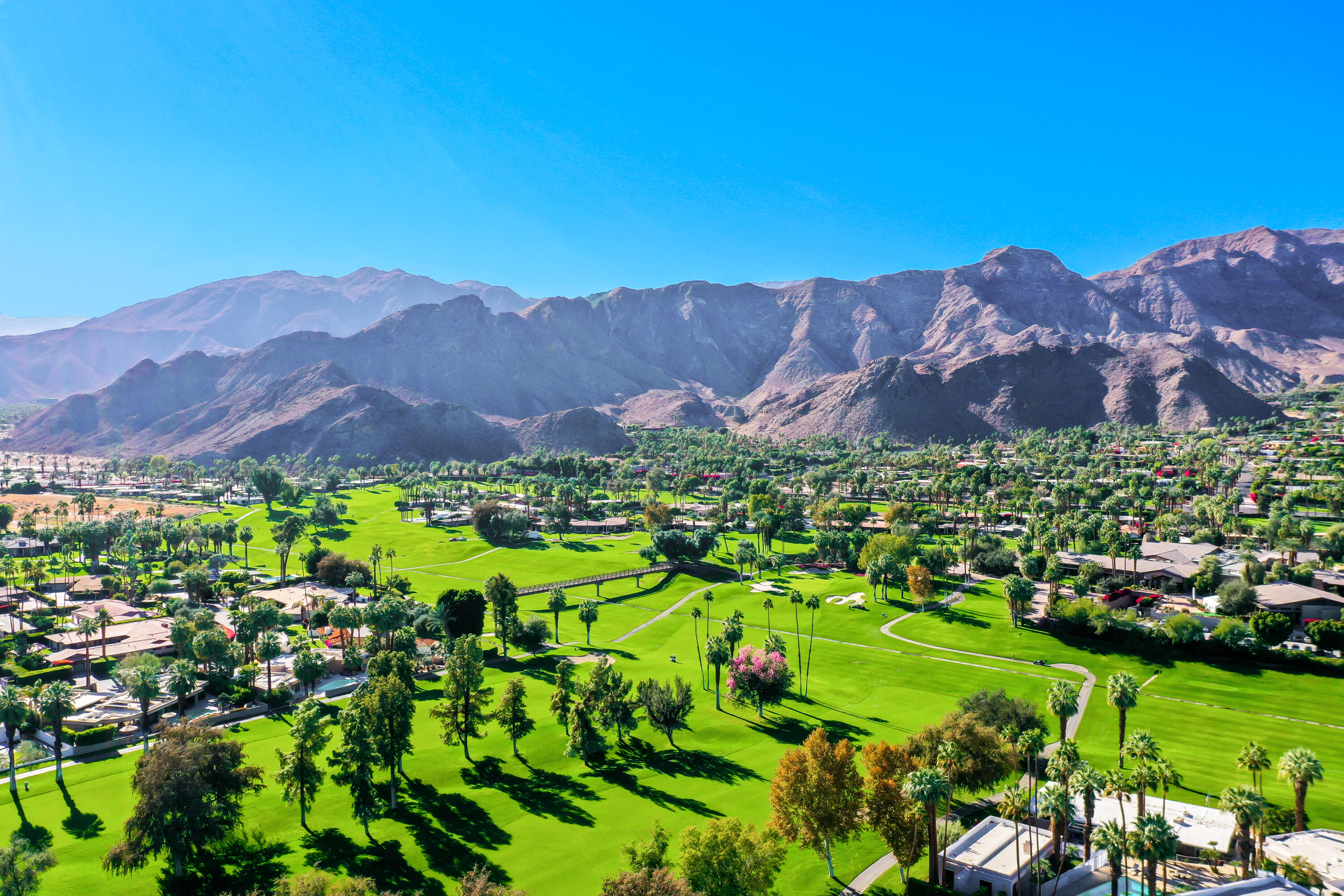 44 Fincher Way Rancho Mirage, CA 92270 - Photo 54 of 56 a view of a lush green hillside and houses