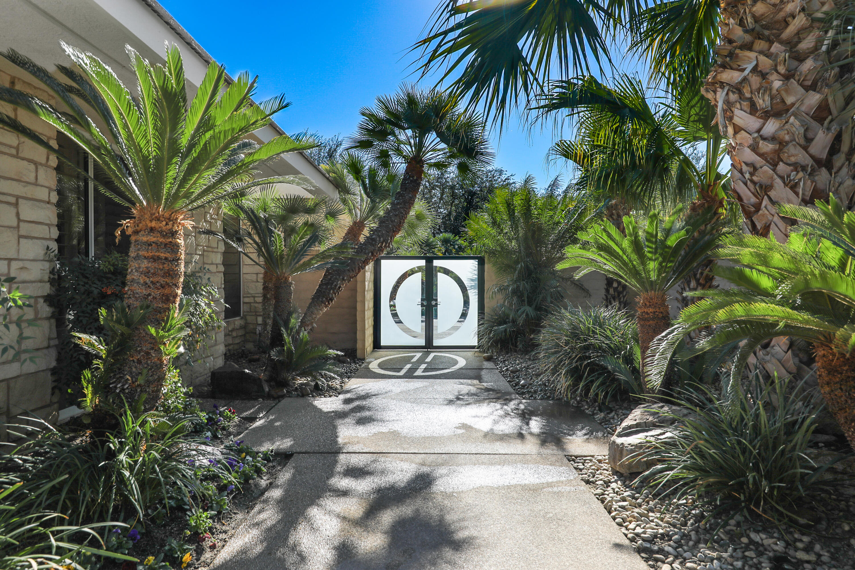 44 Fincher Way Rancho Mirage, CA 92270 - Photo 7 of 56 a view of a yard with a plants