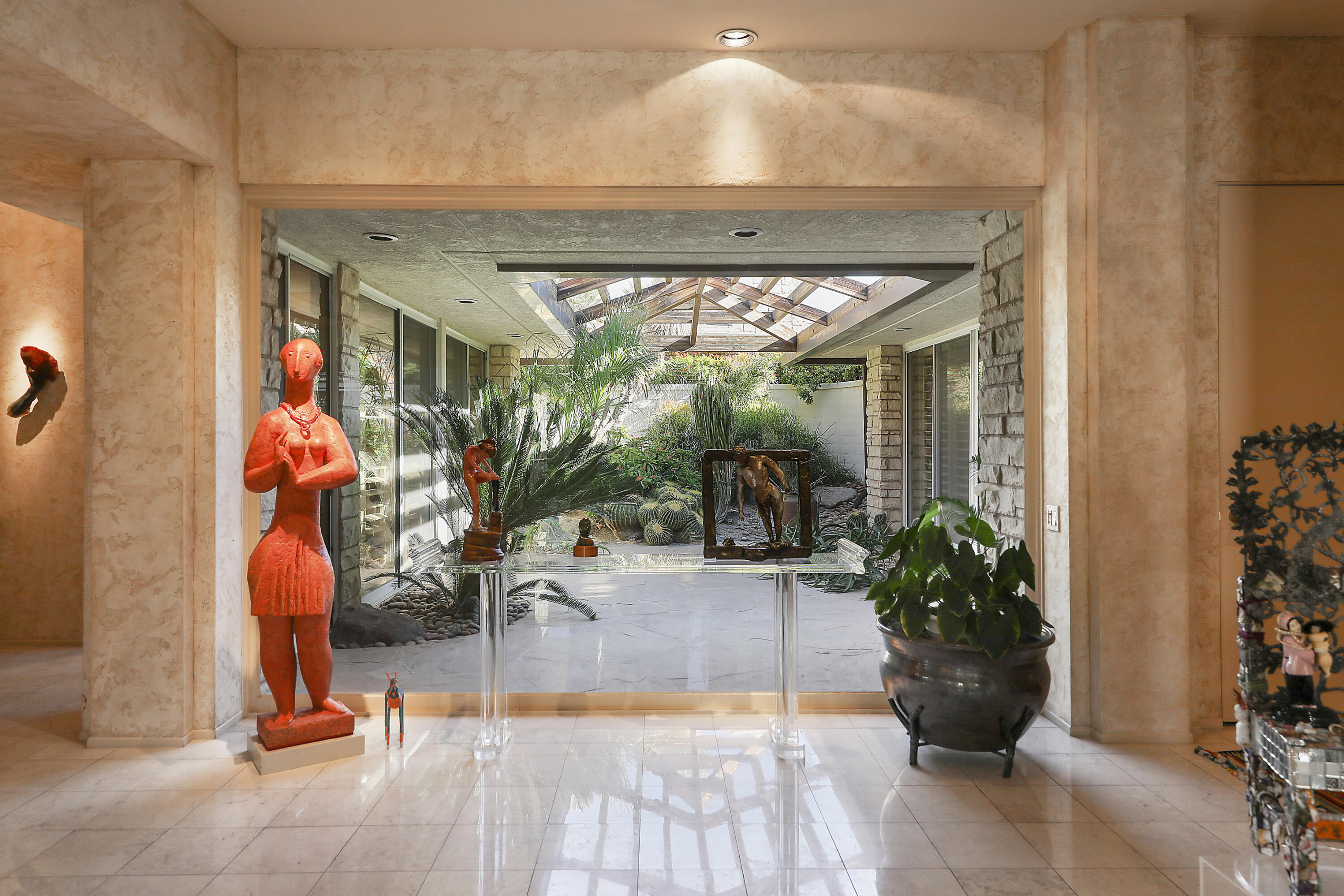 44 Fincher Way Rancho Mirage, CA 92270 - Photo 9 of 56 a view of a entryway door of the house