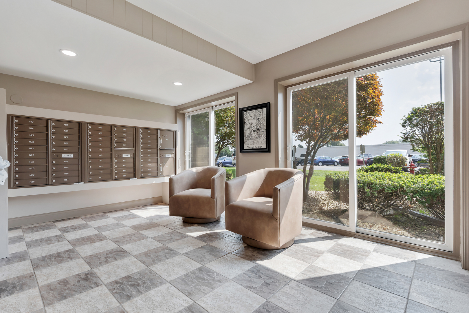 2900 Maple Avenue, Unit 17E Downers Grove, IL 60515 - Photo 2 of 19 a living room with furniture and large windows