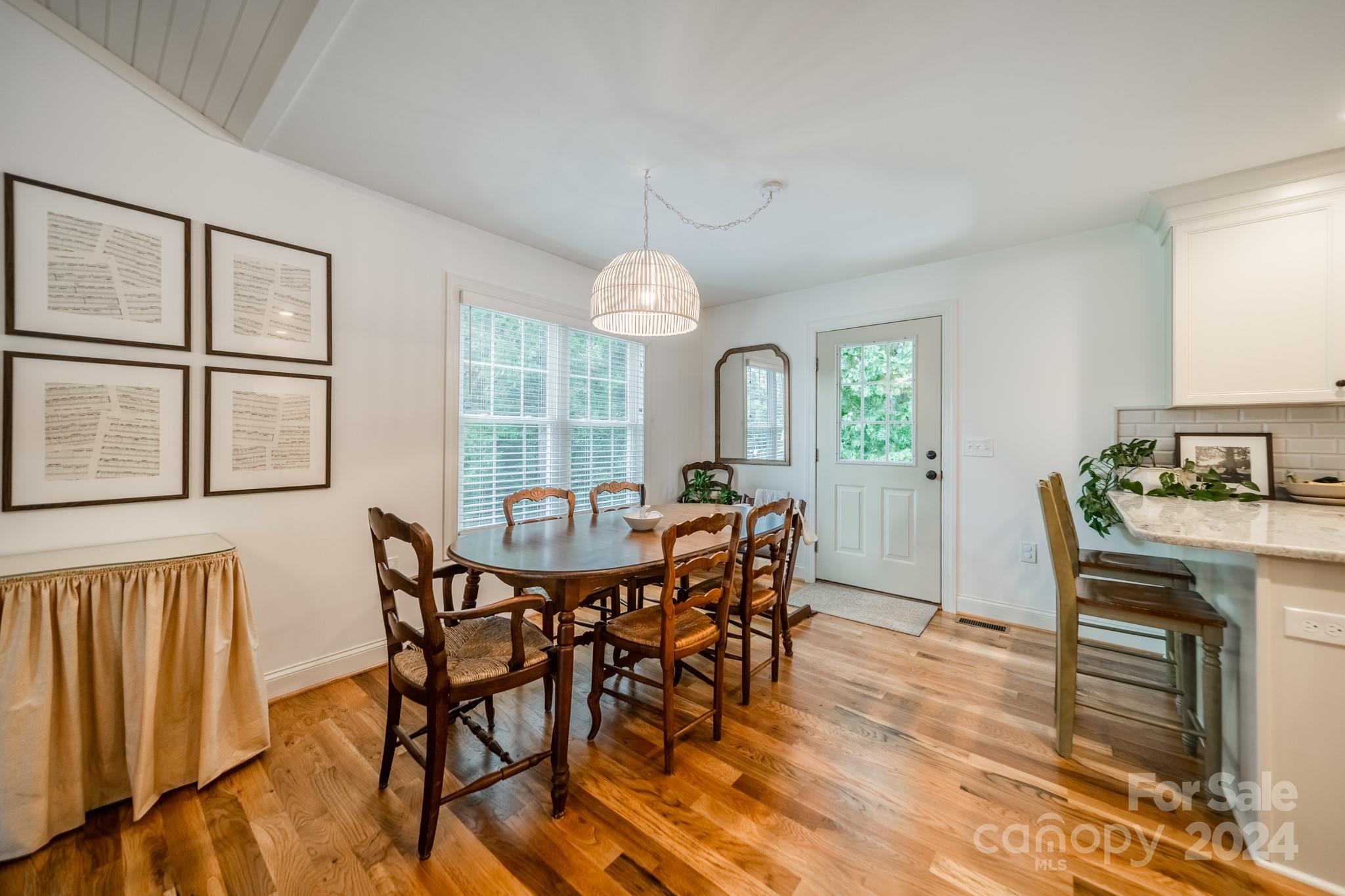 101 North Lane Road Mount Holly, NC 28120 - Photo 18 of 33 a view of a dining room with furniture window and wooden floor