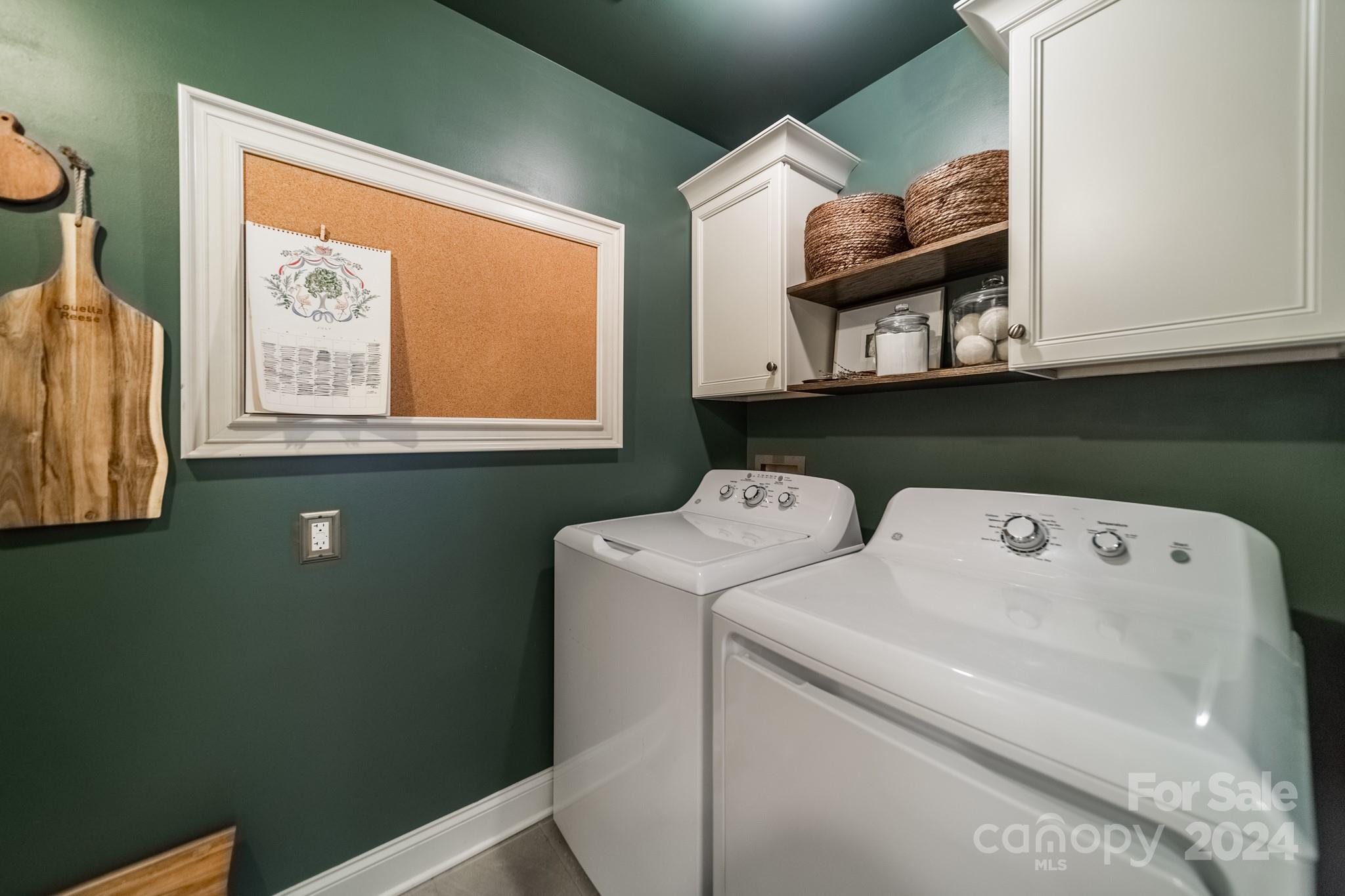 101 North Lane Road Mount Holly, NC 28120 - Photo 23 of 33 a view of storage and utility room with washer and dryer