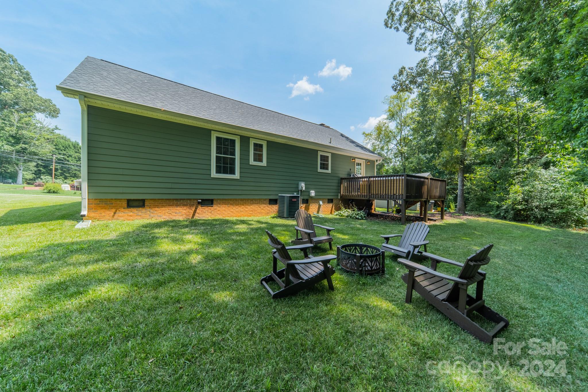 101 North Lane Road Mount Holly, NC 28120 - Photo 26 of 33 a backyard of a house with table and chairs