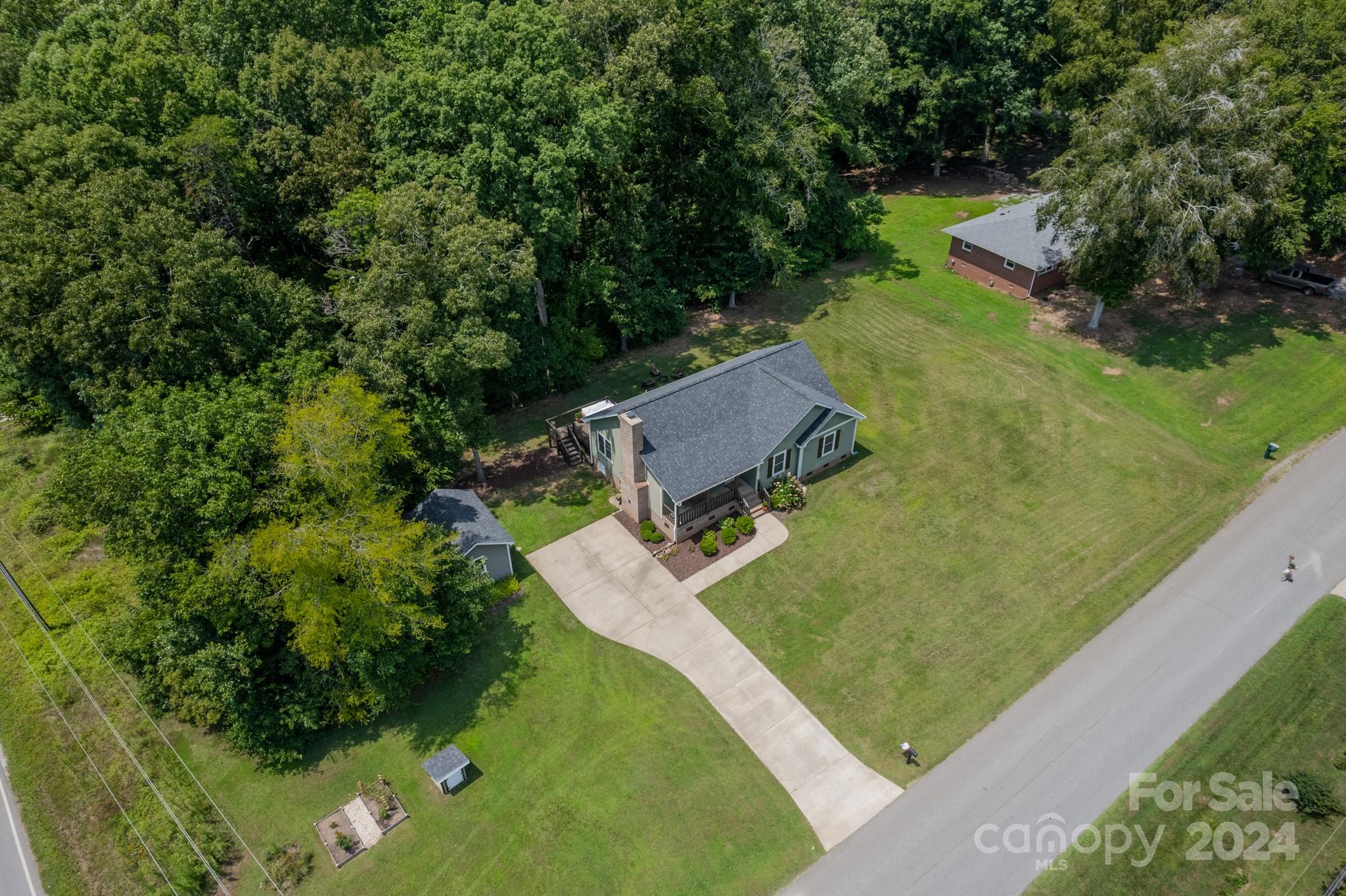 101 North Lane Road Mount Holly, NC 28120 - Photo 30 of 33 an aerial view of a house with a yard