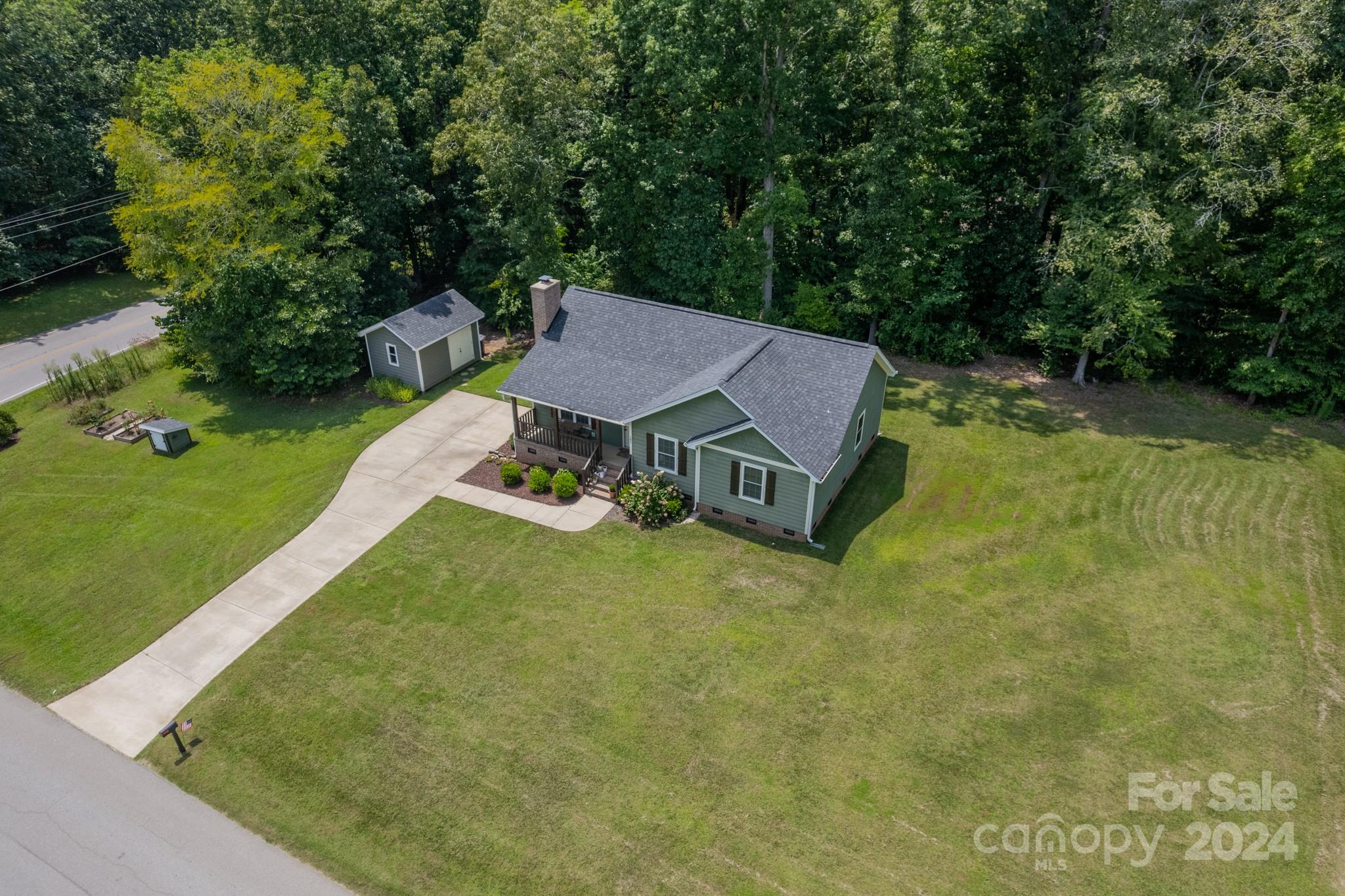 101 North Lane Road Mount Holly, NC 28120 - Photo 32 of 33 an aerial view of a house with a yard