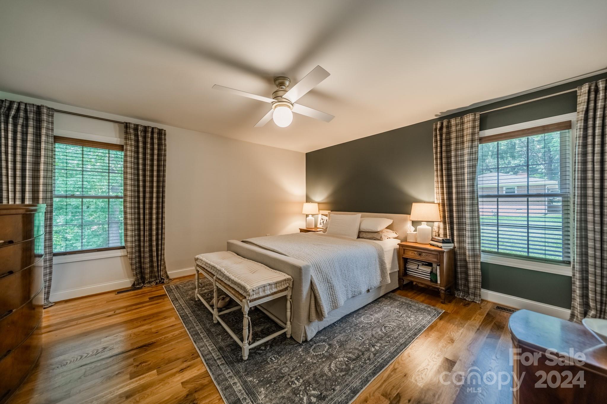 101 North Lane Road Mount Holly, NC 28120 - Photo 8 of 33 a bedroom with a bed and wooden floor