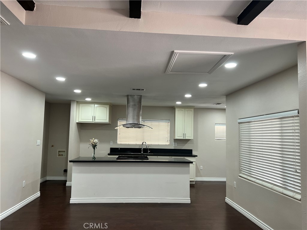 9352 Beverly Road Pico Rivera, CA 90660 - Photo 19 of 35 a large kitchen with stainless steel appliances a large counter top