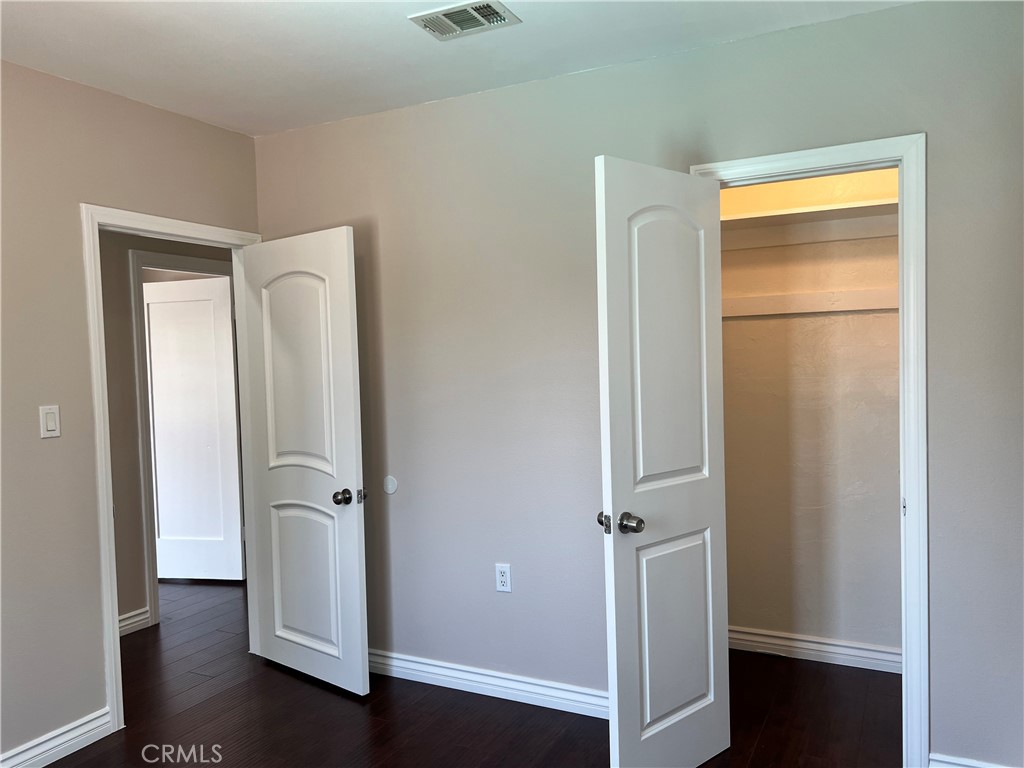9352 Beverly Road Pico Rivera, CA 90660 - Photo 21 of 35 a view of empty room with wooden floor