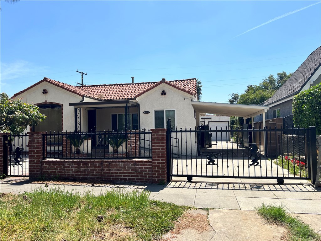9352 Beverly Road Pico Rivera, CA 90660 - Photo 35 of 35 front view of a house with a small yard