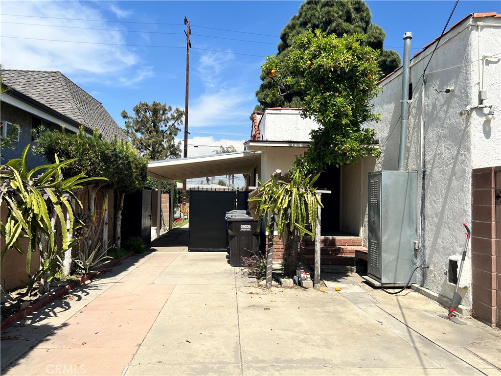 9352 Beverly Road Pico Rivera, CA 90660 - Photo 8 of 35 a backyard of a house with potted plants